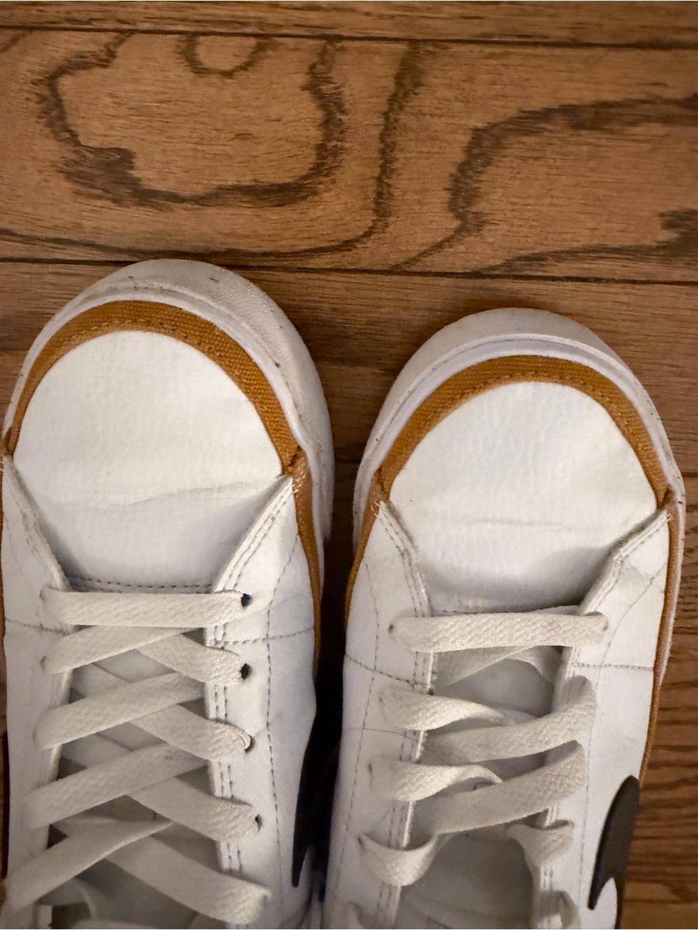 Nike White Sneakers with Black Swoosh and Gold Accent - Picture 5 of 5